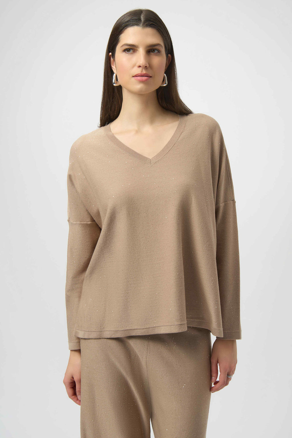 Joseph Ribkoff Sequined Sweater Knit Boxy Top in Fawn, from the front, back, and side, highlighting the relaxed boxy fit, V-neckline, dolman sleeves, and the fine sequin-embroidered sweater knit texture that adds a subtle allover shimmer.