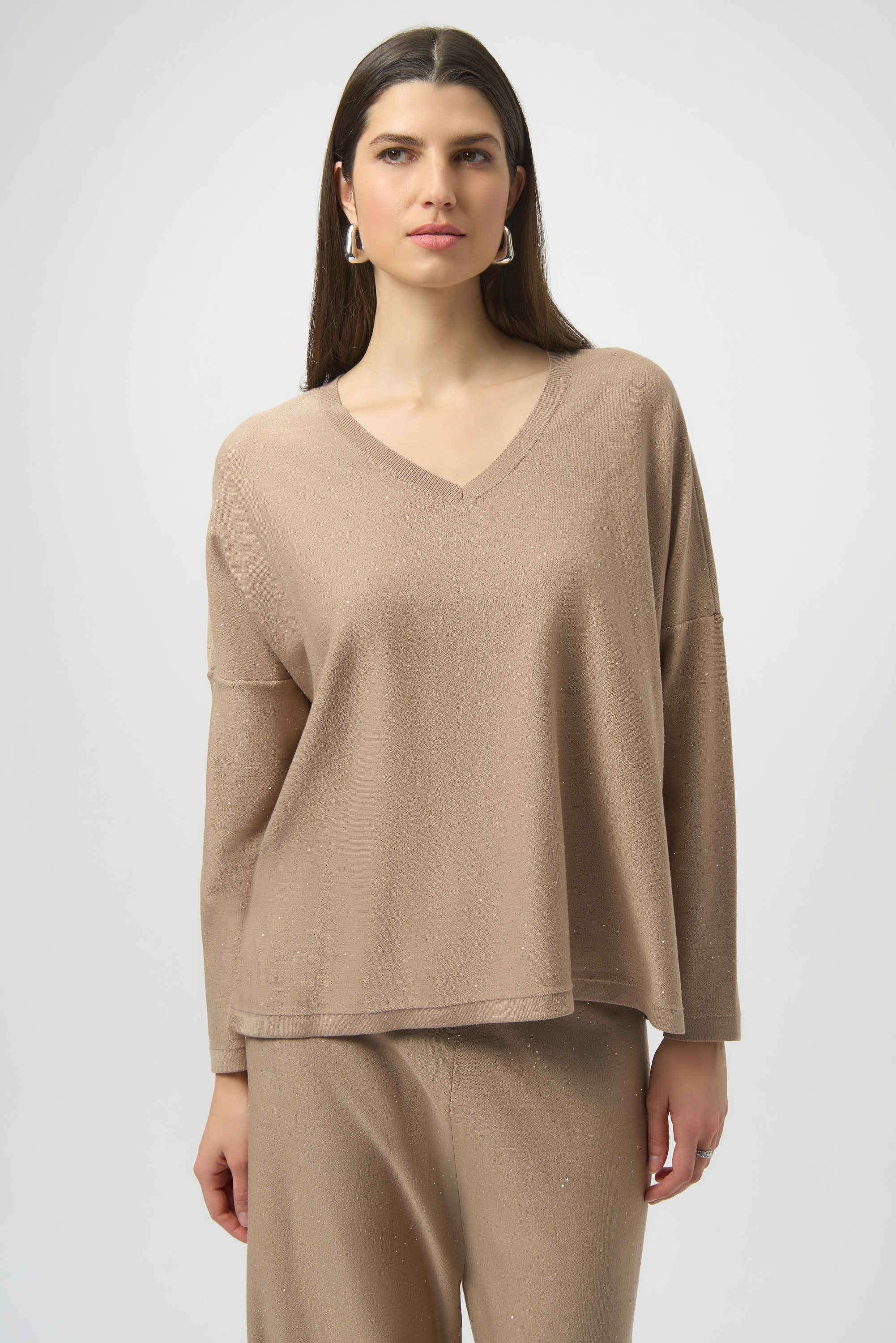 Joseph Ribkoff Sequined Sweater Knit Boxy Top in Fawn, from the front, back, and side, highlighting the relaxed boxy fit, V-neckline, dolman sleeves, and the fine sequin-embroidered sweater knit texture that adds a subtle allover shimmer.