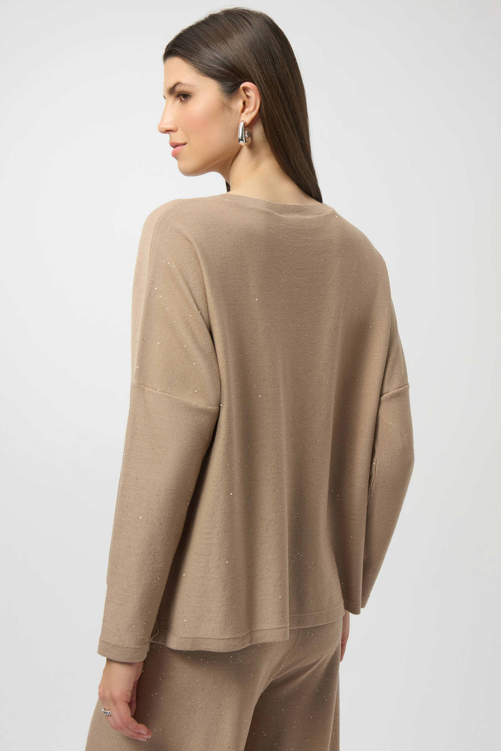 Joseph Ribkoff Sequined Sweater Knit Boxy Top in Fawn, from the front, back, and side, highlighting the relaxed boxy fit, V-neckline, dolman sleeves, and the fine sequin-embroidered sweater knit texture that adds a subtle allover shimmer.