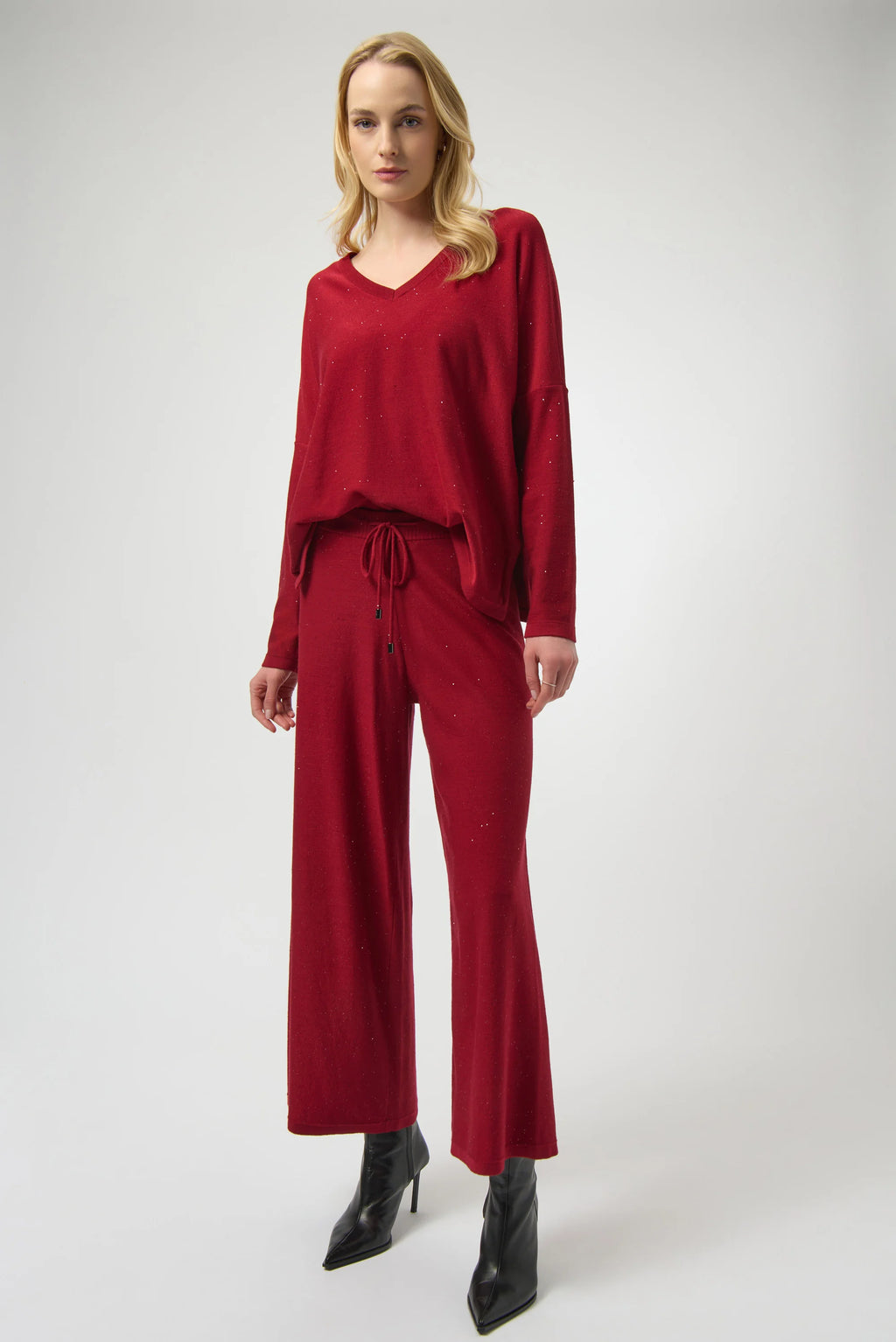 Sequined Sweater Knit Culotte Pants by Joseph Ribkoff, highlighting the viscose blend texture, shimmering sequins, culotte silhouette, and elastic waistband.