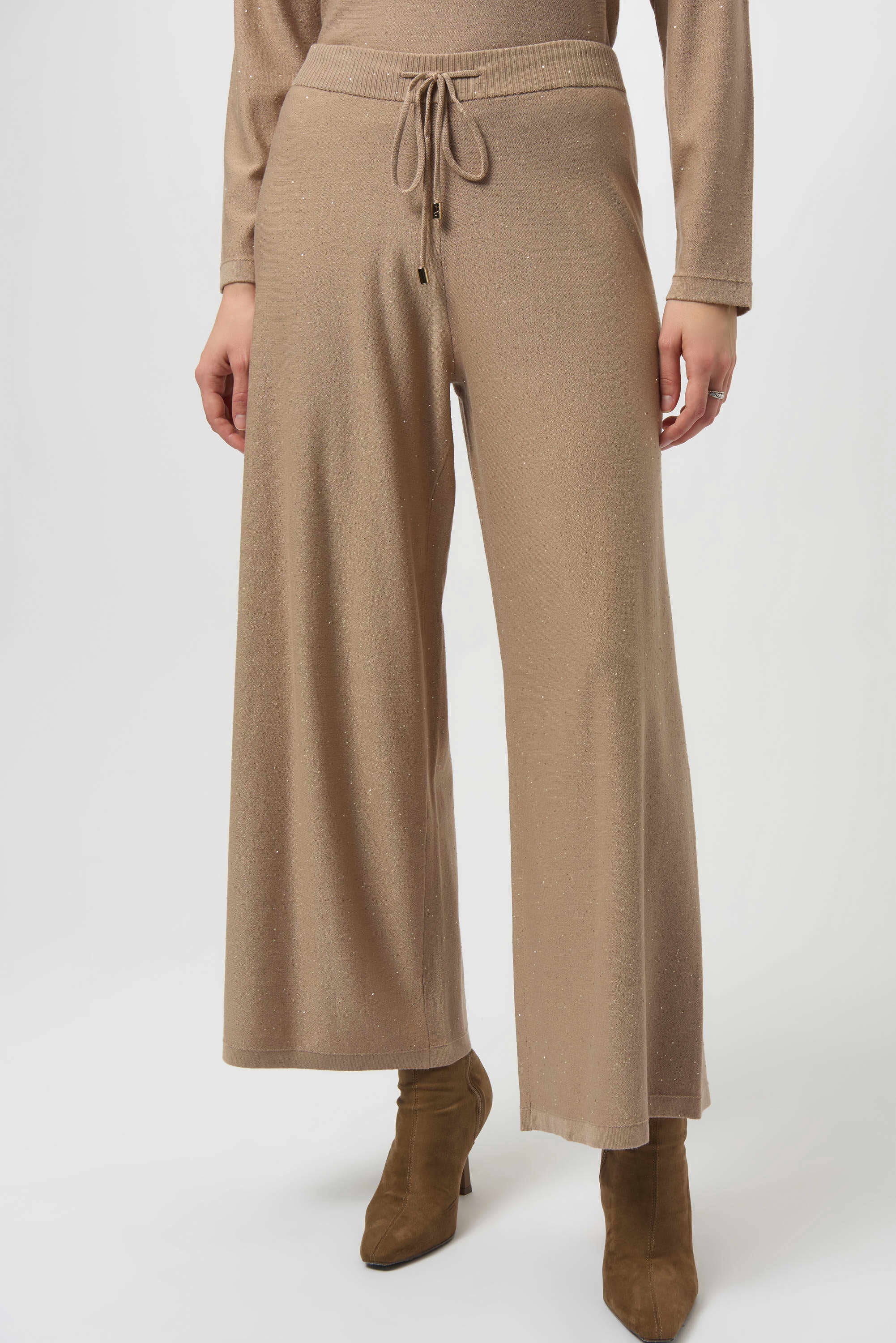 Sequined Sweater Knit Culotte Pants by Joseph Ribkoff, highlighting the viscose blend texture, shimmering sequins, culotte silhouette, and elastic waistband.