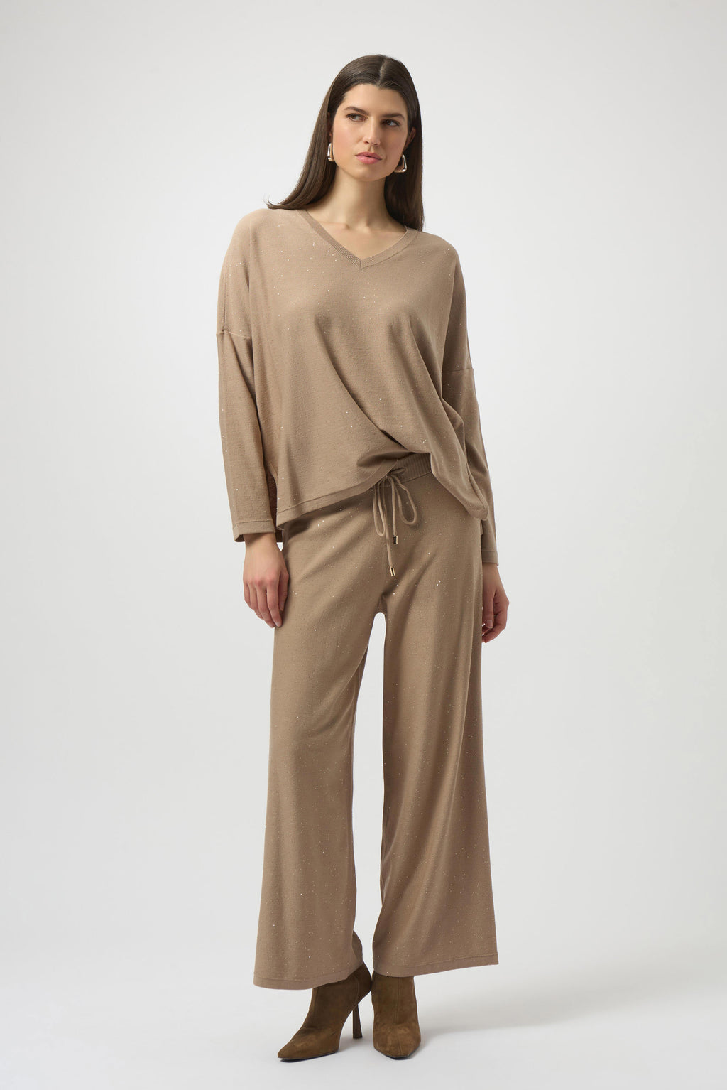 Sequined Sweater Knit Culotte Pants by Joseph Ribkoff, highlighting the viscose blend texture, shimmering sequins, culotte silhouette, and elastic waistband.