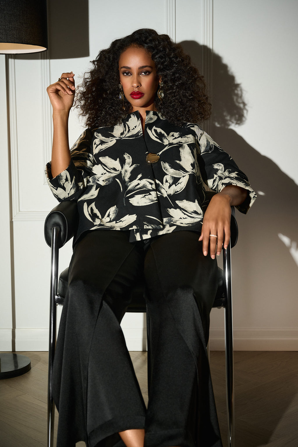 Jacquard Floral Print Swing Jacket by Joseph Ribkoff, highlighting the floral jacquard pattern, funnel collar, three-quarter cuffed sleeves, and swing silhouette.