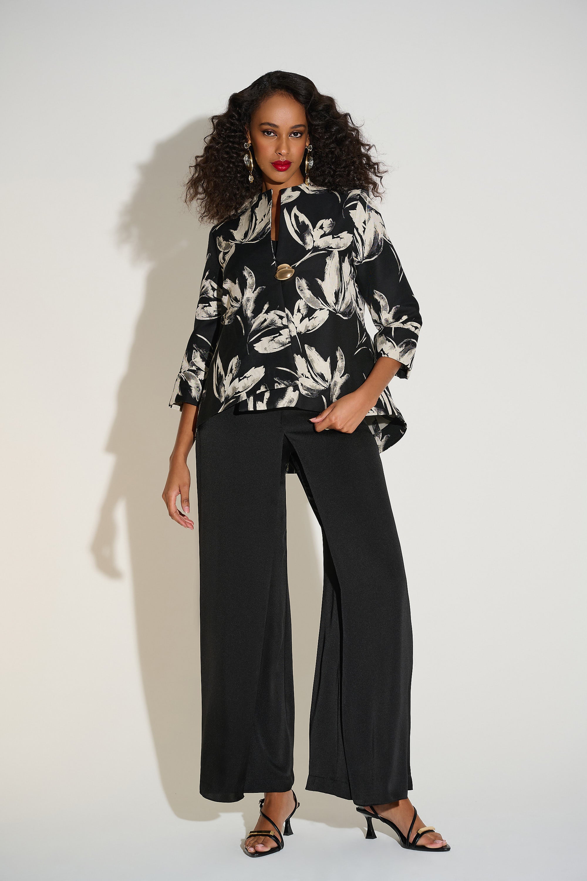 Jacquard Floral Print Swing Jacket by Joseph Ribkoff, highlighting the floral jacquard pattern, funnel collar, three-quarter cuffed sleeves, and swing silhouette.