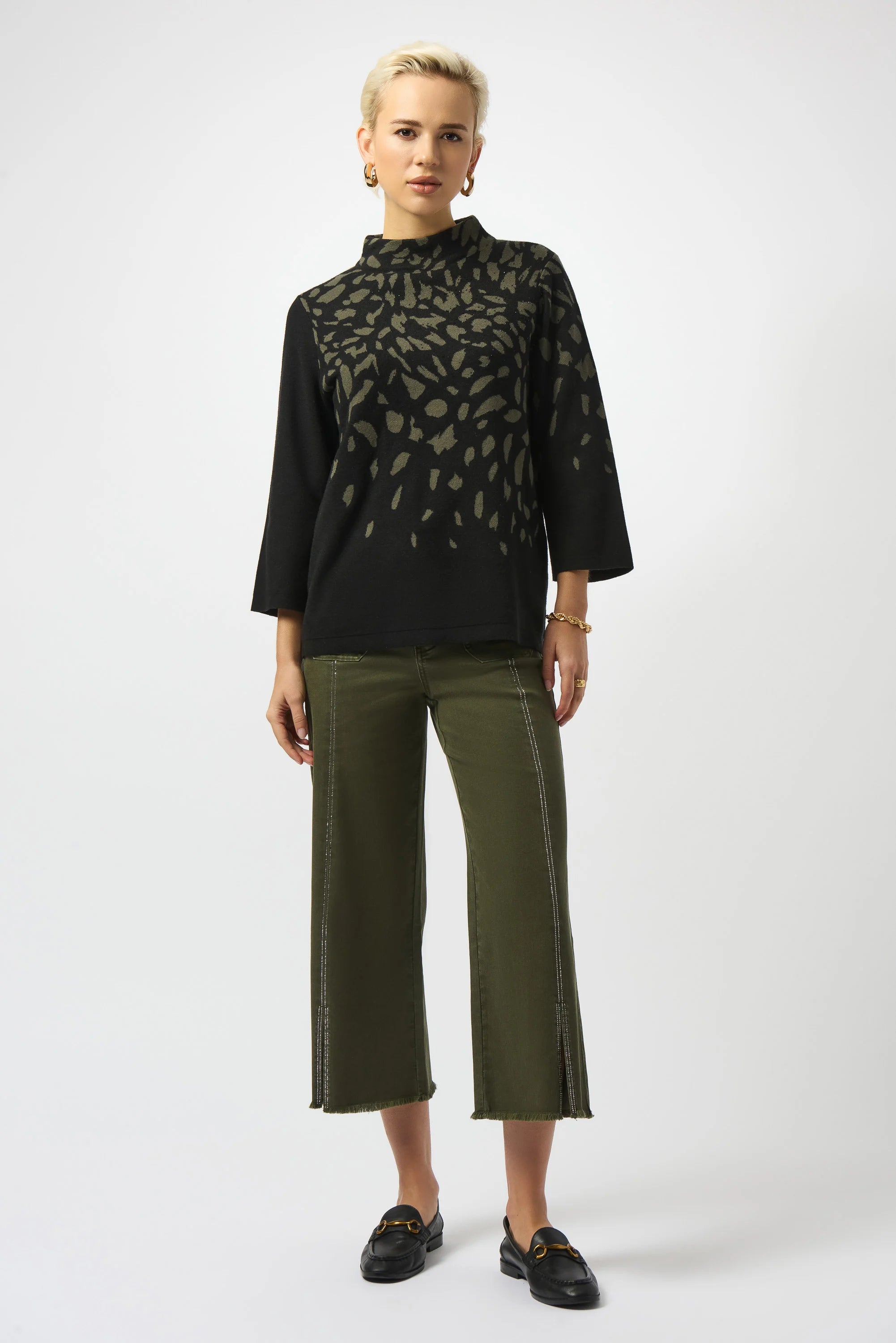 Jacquard Animal Print Sweater from Joseph Ribkoff, highlighting intricate animal print patterns, soft knit texture, relaxed fit, and classic styling. Photos present front, side, and detailed close-ups to emphasize fabric quality and print clarity.