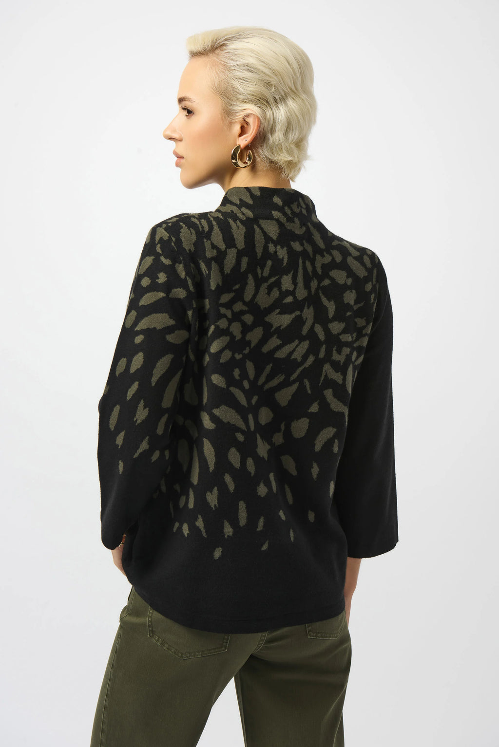 Jacquard Animal Print Sweater from Joseph Ribkoff, highlighting intricate animal print patterns, soft knit texture, relaxed fit, and classic styling. Photos present front, side, and detailed close-ups to emphasize fabric quality and print clarity.