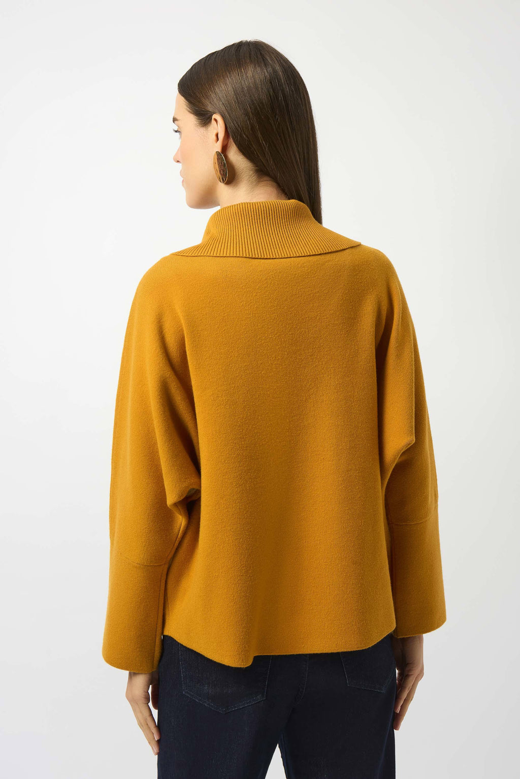 Showcasing the Sweater Knit Boxy Pullover with Zipped Collar by Joseph Ribkoff. Highlights include the relaxed boxy silhouette, functional zip collar, bell sleeves. Available colors Black, Winter White, Avocado, and Medallion, emphasizing fabric texture and fit.