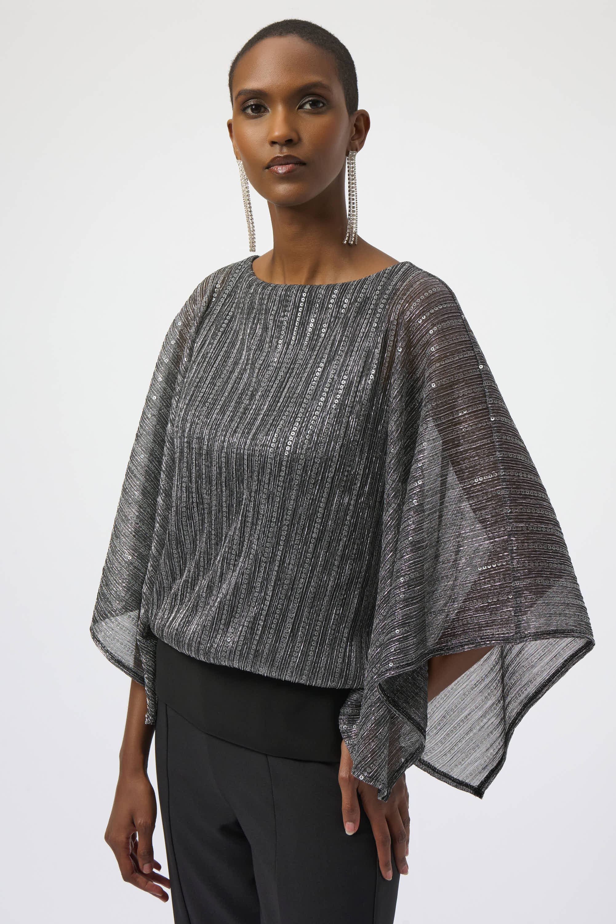 Sequined Pleated Knit Layered Top by Joseph Ribkoff, highlighting the pleated knit texture, shimmering sequin accents, and layered design. Photos include front, back, and close-up views to emphasize the fabric’s sparkle and construction details.