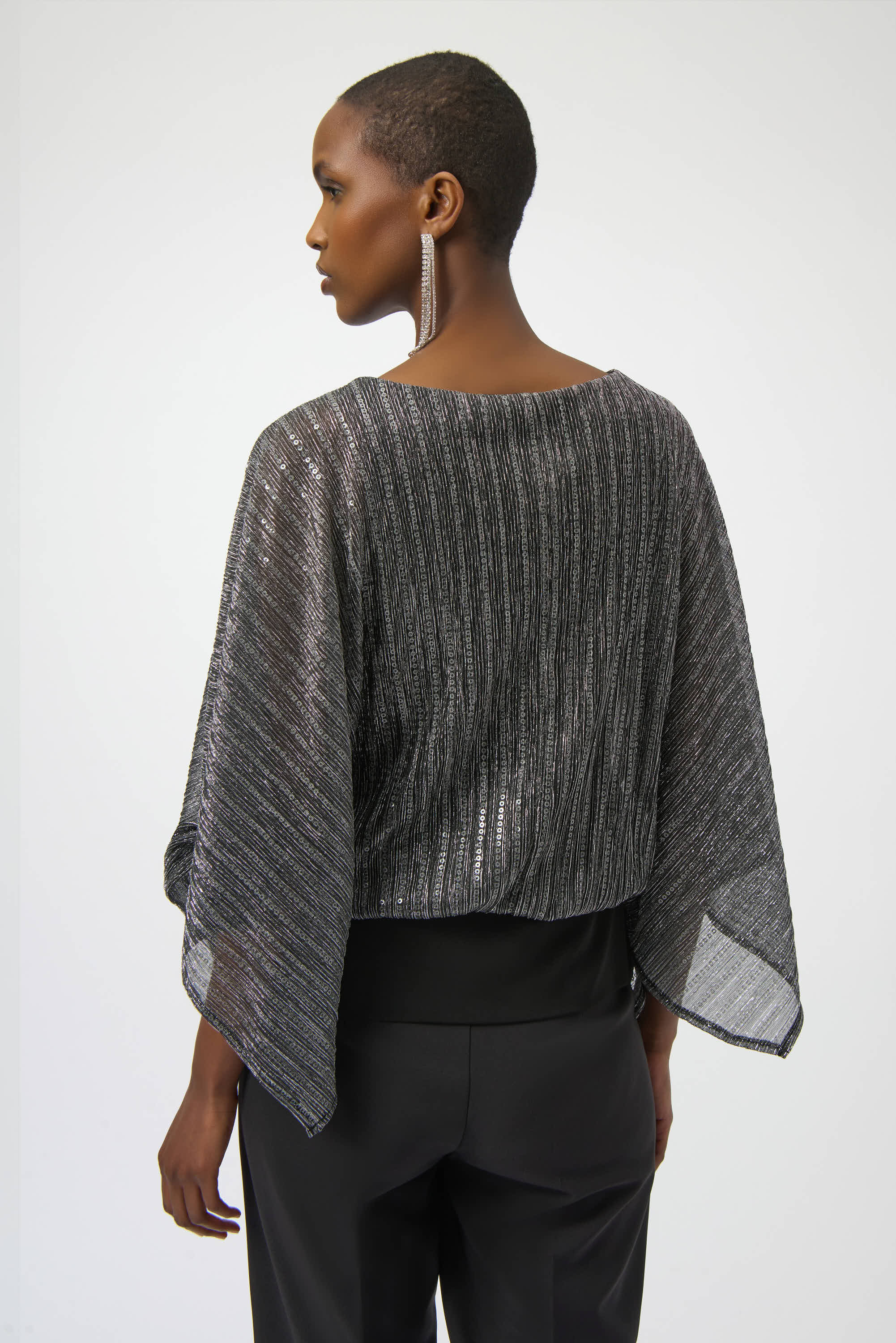 Sequined Pleated Knit Layered Top by Joseph Ribkoff, highlighting the pleated knit texture, shimmering sequin accents, and layered design. Photos include front, back, and close-up views to emphasize the fabric’s sparkle and construction details.