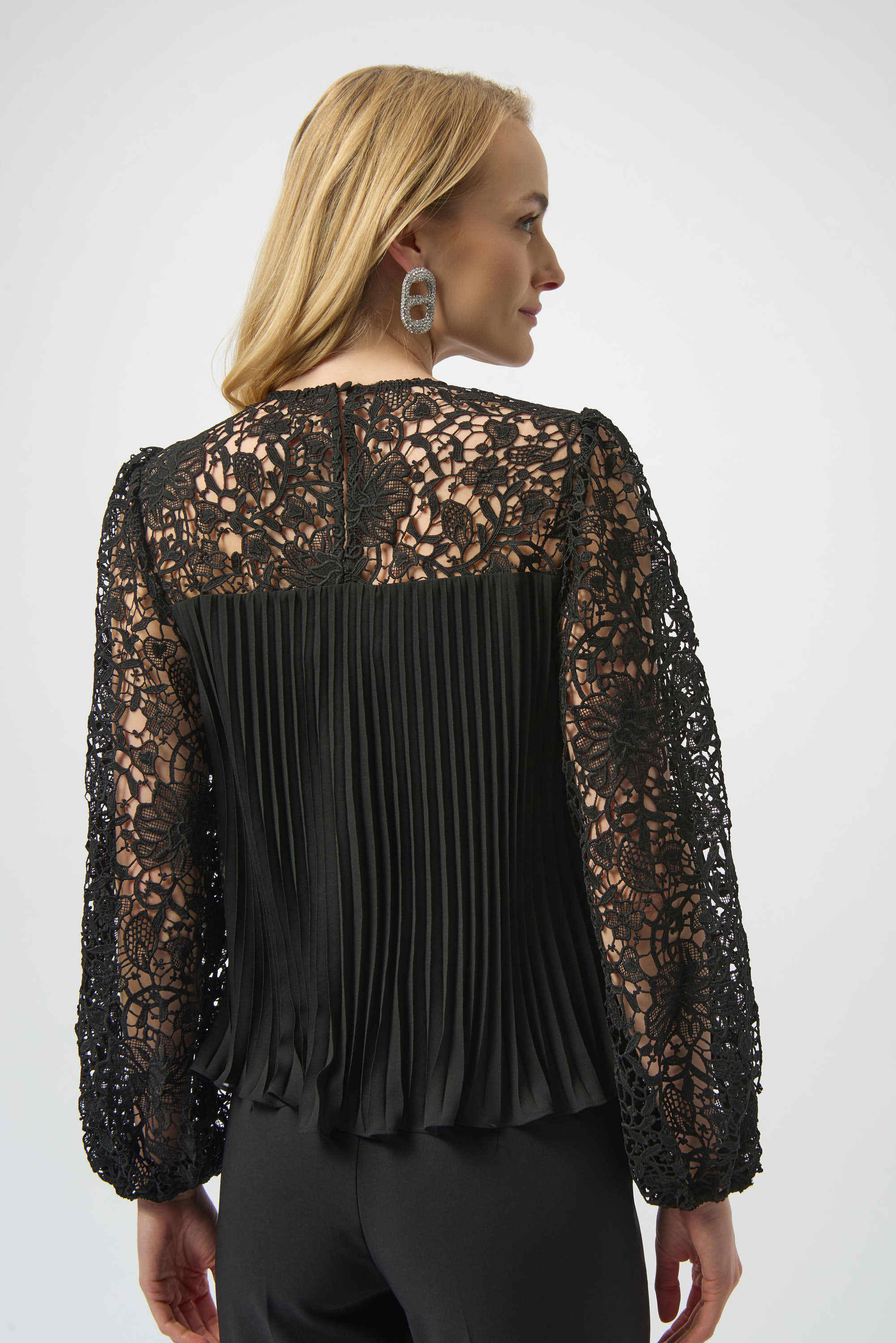 Pleated Chiffon Top by Joseph Ribkoff from various angles. Highlights include the finely pleated chiffon fabric, detailed floral lace sleeves, and the flowing relaxed fit. Photos capture front, side, and close-up views that emphasize fabric texture and intricate lacework.