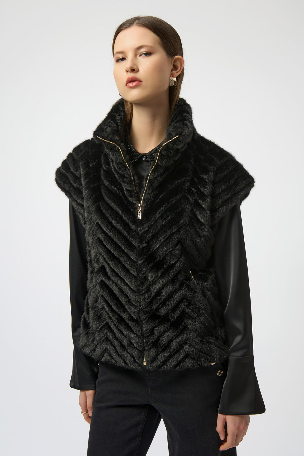 Sweater Knit Boxy Pullover with Zipped Collar by Joseph Ribkoff, showcasing its relaxed boxy fit, functional zip-up collar, and long sleeves. The images highlight the soft knit fabric texture and the pullover’s availability in four stylish colors: Black, Winter White, Avocado, and Medallion. Photos capture front, back, and close-up details to illustrate design and quality.