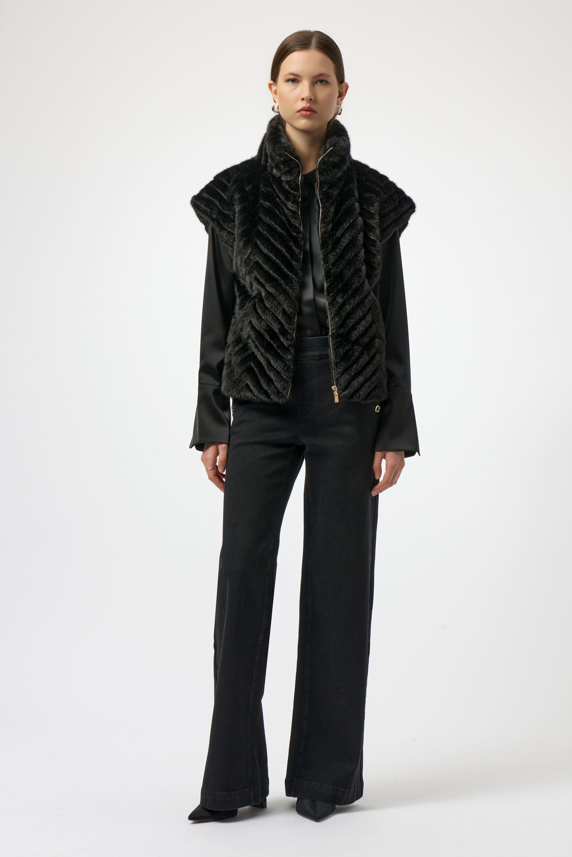 Sweater Knit Boxy Pullover with Zipped Collar by Joseph Ribkoff, showcasing its relaxed boxy fit, functional zip-up collar, and long sleeves. The images highlight the soft knit fabric texture and the pullover’s availability in four stylish colors: Black, Winter White, Avocado, and Medallion. Photos capture front, back, and close-up details to illustrate design and quality.