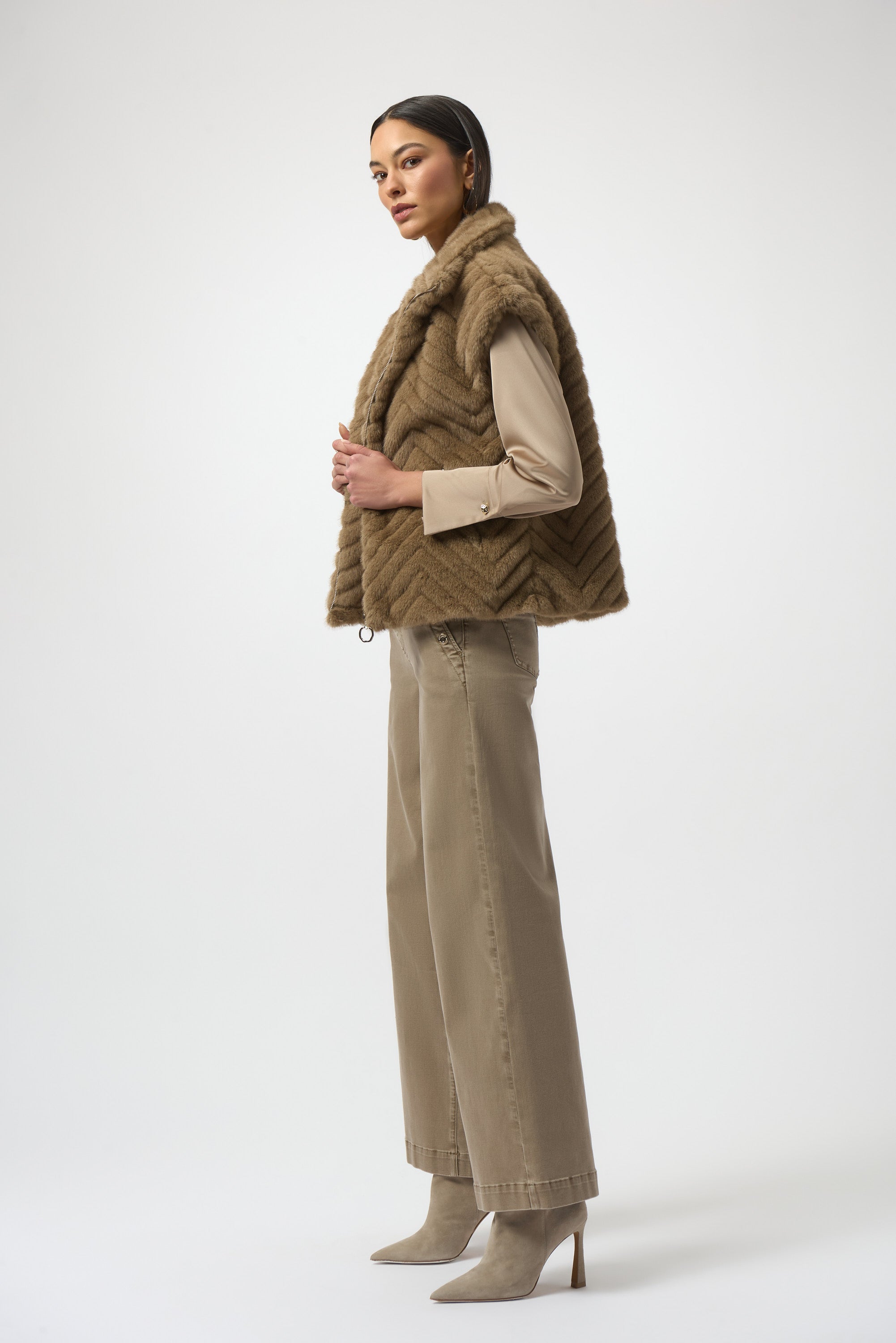 Sweater Knit Boxy Pullover with Zipped Collar by Joseph Ribkoff, showcasing its relaxed boxy fit, functional zip-up collar, and long sleeves. The images highlight the soft knit fabric texture and the pullover’s availability in four stylish colors: Black, Winter White, Avocado, and Medallion. Photos capture front, back, and close-up details to illustrate design and quality.