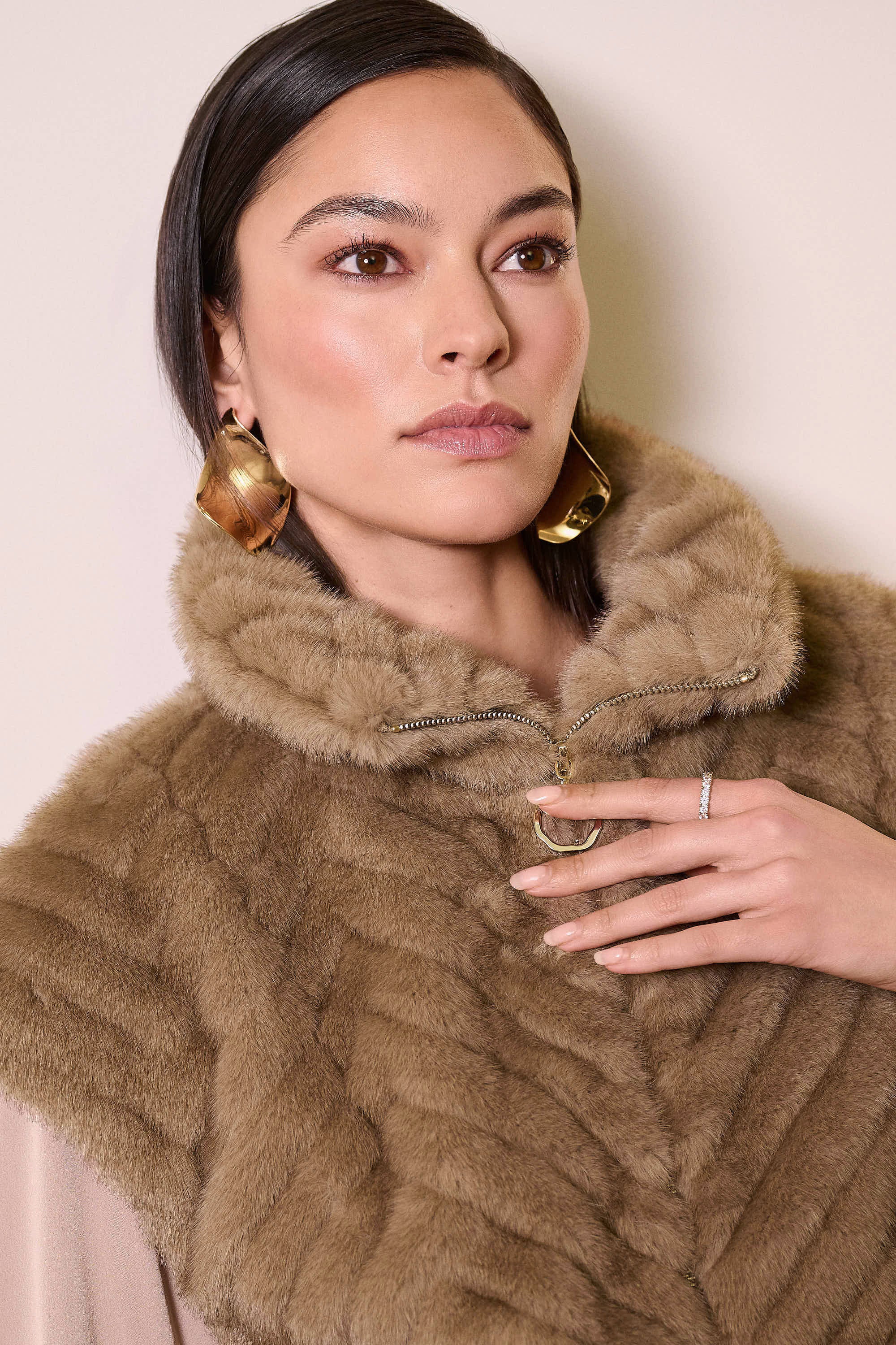 Sweater Knit Boxy Pullover with Zipped Collar by Joseph Ribkoff, showcasing its relaxed boxy fit, functional zip-up collar, and long sleeves. The images highlight the soft knit fabric texture and the pullover’s availability in four stylish colors: Black, Winter White, Avocado, and Medallion. Photos capture front, back, and close-up details to illustrate design and quality.