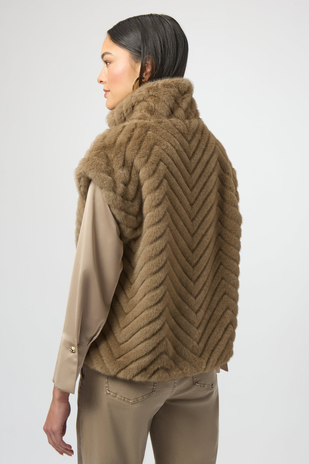Sweater Knit Boxy Pullover with Zipped Collar by Joseph Ribkoff, showcasing its relaxed boxy fit, functional zip-up collar, and long sleeves. The images highlight the soft knit fabric texture and the pullover’s availability in four stylish colors: Black, Winter White, Avocado, and Medallion. Photos capture front, back, and close-up details to illustrate design and quality.
