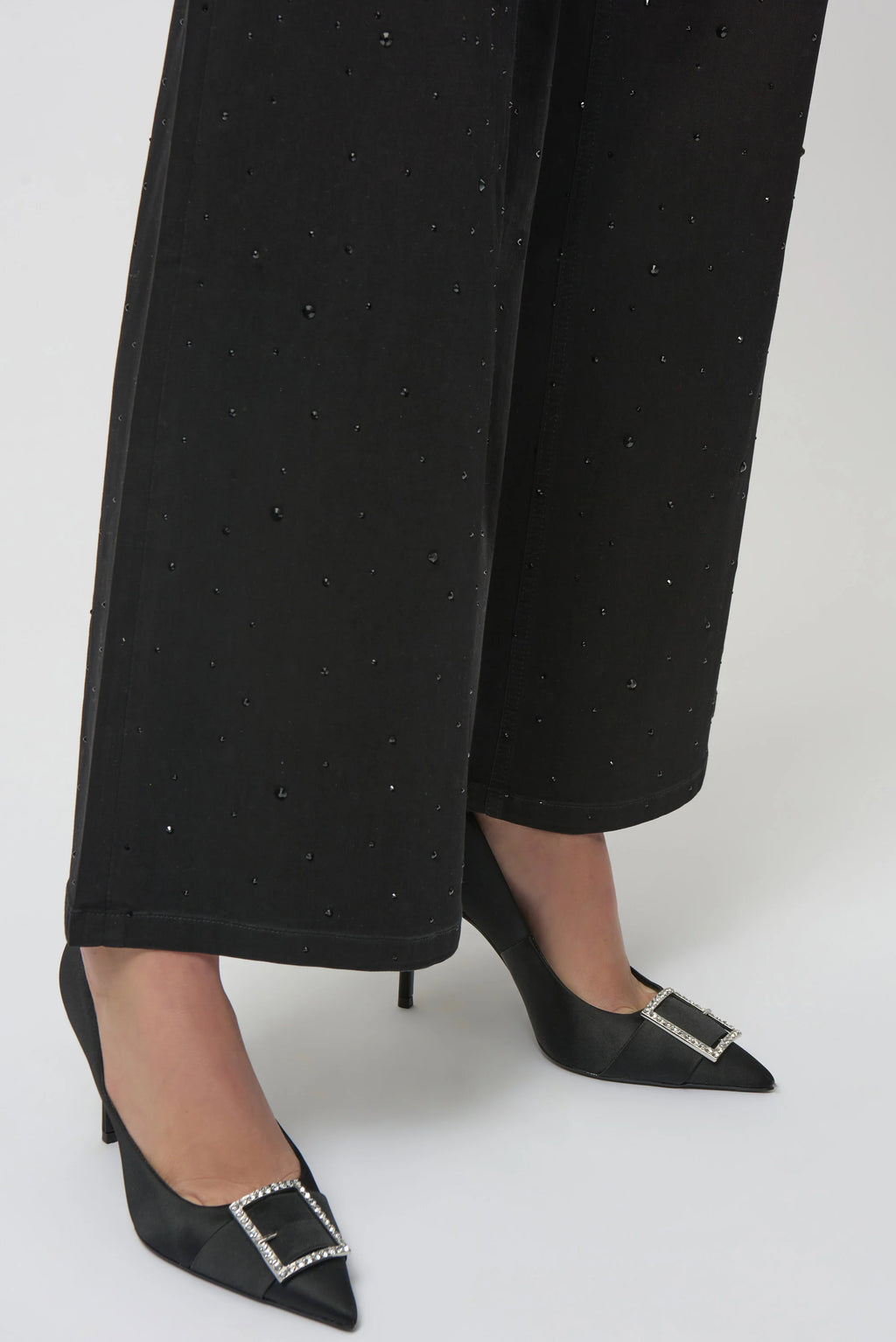 Presenting the black Classic Wide Leg Jeans with rhinestone details by Joseph Ribkoff. Showcasing the wide-leg cut, rhinestone accents on the seams, and rich denim texture. Views include front, back, and close-ups highlighting the sparkle and craftsmanship.