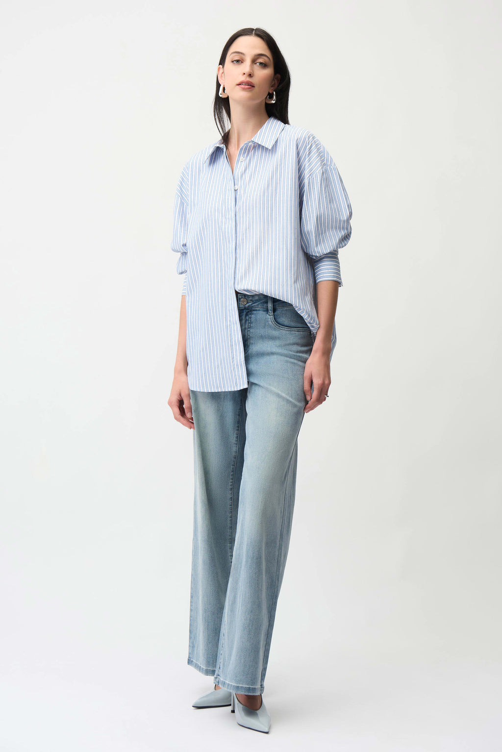 Clear product images showcasing the Tencel Stripe Print Boxy Blouse by Joseph Ribkoff. Highlighting the relaxed boxy fit, vertical stripe pattern, classic collar, and buttoned long sleeves. Visual details emphasize the soft fabric texture and stylish versatility suitable for various occasions.