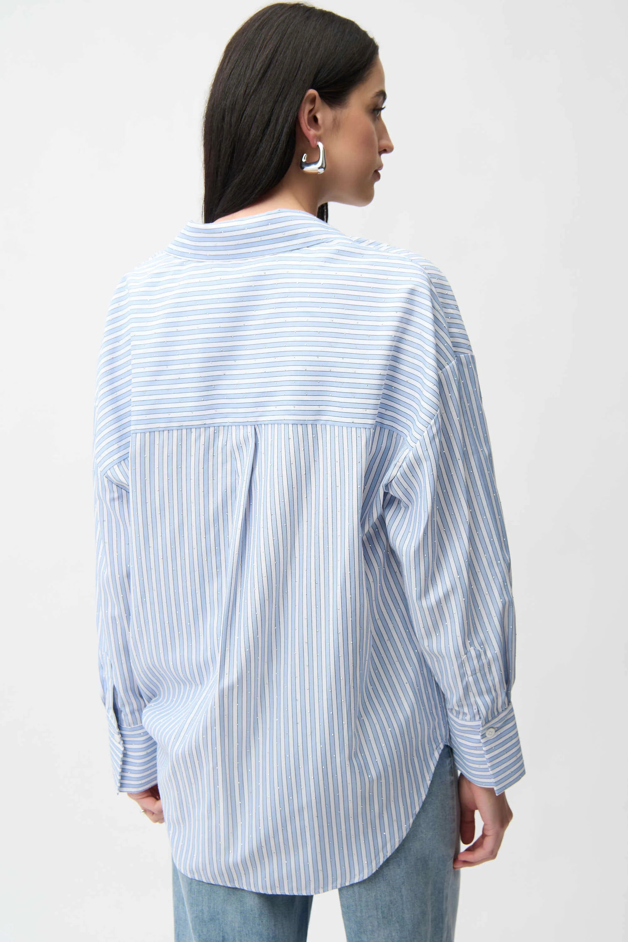Clear product images showcasing the Tencel Stripe Print Boxy Blouse by Joseph Ribkoff. Highlighting the relaxed boxy fit, vertical stripe pattern, classic collar, and buttoned long sleeves. Visual details emphasize the soft fabric texture and stylish versatility suitable for various occasions.