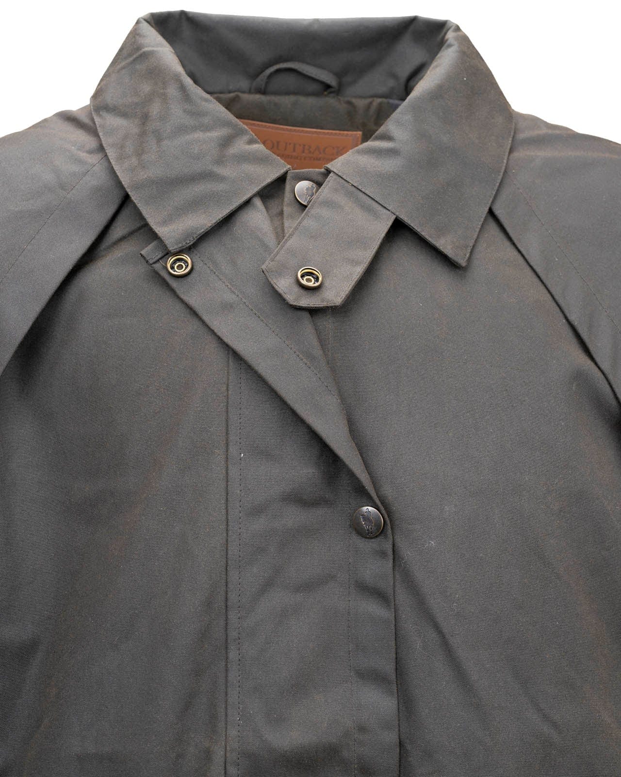 Outback Trading Company Bush Ranger Jacket in brown - showcasing its rugged oilskin texture, heavy-duty metal buttons, adjustable cuffs, and traditional Western styling. Photos include front, back, side, and close-up views of fabric and stitching details to emphasize quality and authenticity.