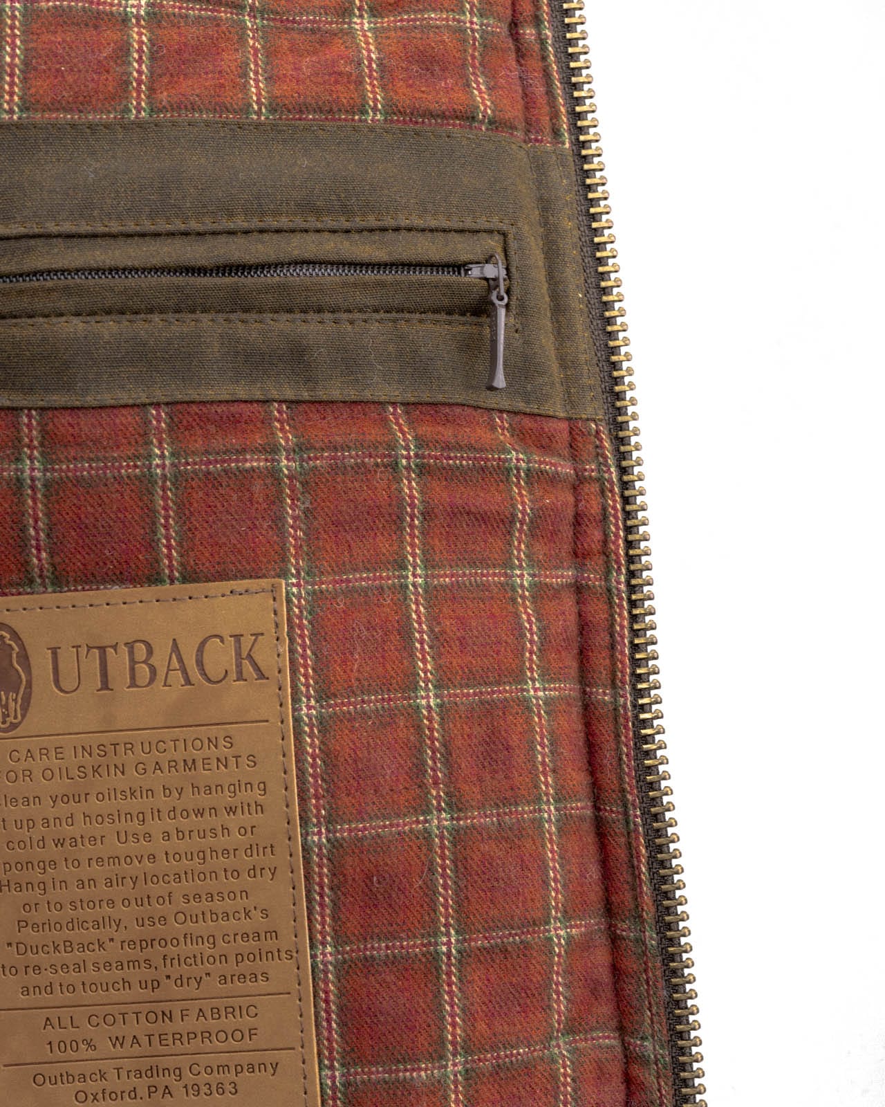 Men's Overlander Vest by Outlander Trading Co. showcasing its rugged water-resistant fabric, front zip and snap closure, multiple pockets, and adjustable side tabs. Views include front, back, and close-up shots highlighting functional details and sturdy craftsmanship.