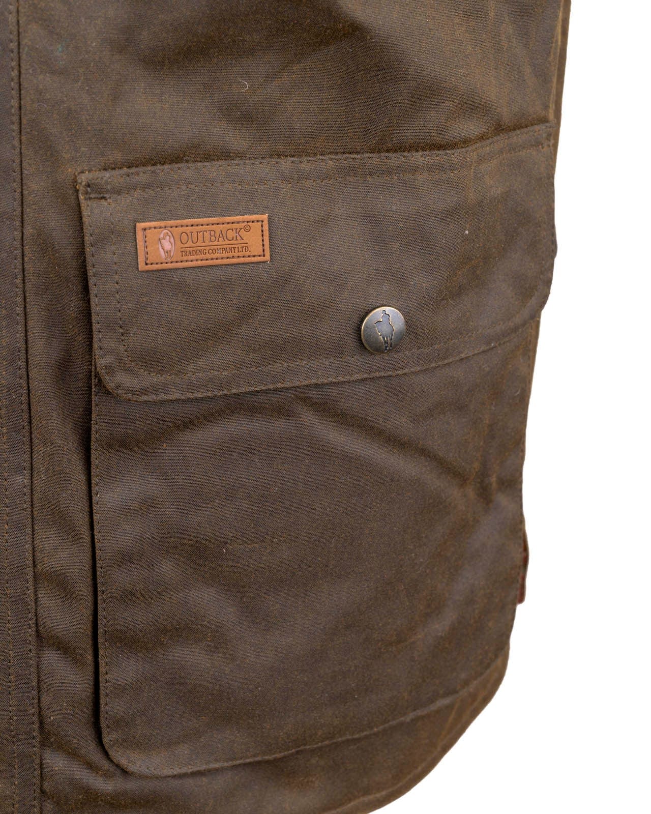 Men's Overlander Vest by Outlander Trading Co. showcasing its rugged water-resistant fabric, front zip and snap closure, multiple pockets, and adjustable side tabs. Views include front, back, and close-up shots highlighting functional details and sturdy craftsmanship.