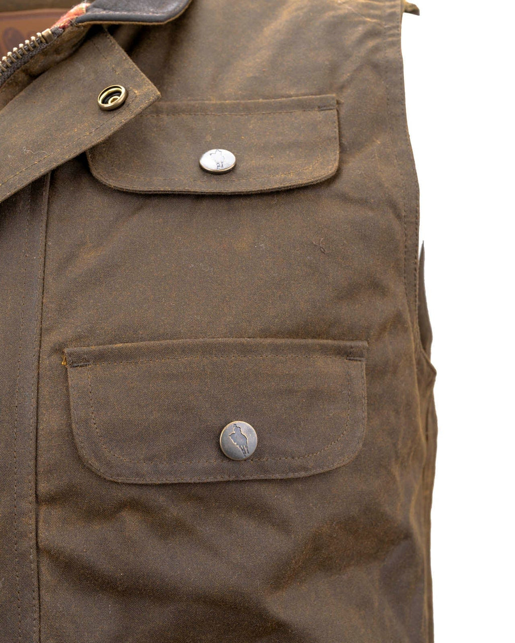 Men's Overlander Vest by Outlander Trading Co. showcasing its rugged water-resistant fabric, front zip and snap closure, multiple pockets, and adjustable side tabs. Views include front, back, and close-up shots highlighting functional details and sturdy craftsmanship.